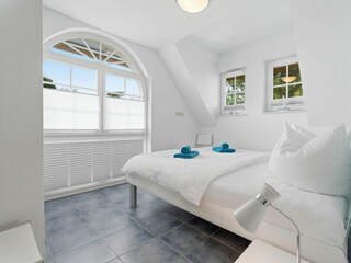 Schlafzimmer mit Doppelbett