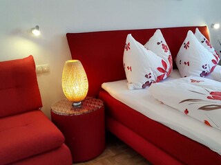 Schlafzimmer mit Zusatzbett