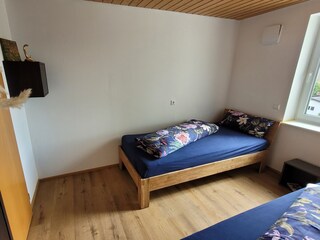 Das Schlafzimmer mit 2 Einzelbetten