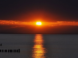 Sonnenuntergang von der Seebrücke aus gesehen