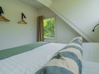 Schlafzimmer 1 mit 2 Einzel-Boxspringbetten