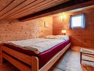 Schlafbereich mit Doppelbett