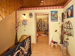Flur Obergeschoss mit Blick in das Schlafzimmer 1