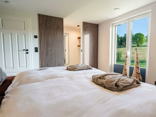 Waldschlafzimmer_mit_begehbarem_Kleiderschrank