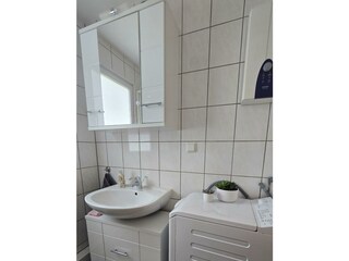 Badezimmer mit Waschmaschine