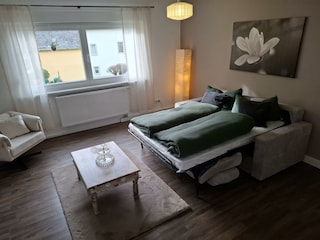 Wohnzimmer 1. OG mit Schlafcouch