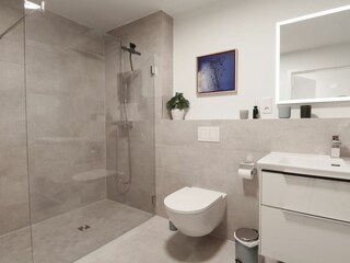 Badezimmer mit bodentiefer Dusche