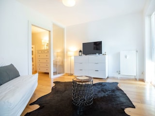 Wohnzimmer mit Schlafcouch (optional)