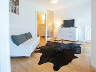 Wohnzimmer mit Schlafcouch (optional)