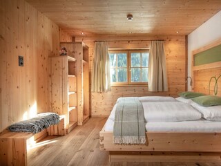 Schlafzimmer in den großen Almsuiten