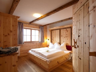 Schlafzimmer in unseren Almsuiten