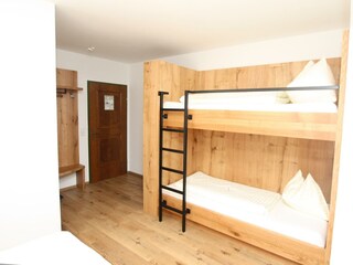 Stockbett in der Familiensuite Gosaukamm