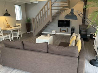 Das gemütliche Wohnzimmer mit Kamin