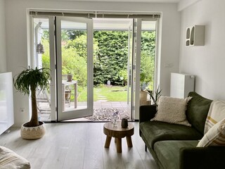 Relax in the sitting area with views of the garden
