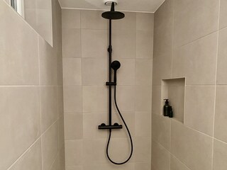 Enjoy the walk-in shower, complete with a rain shower