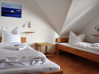 Schlafzimmer mit Einzelbetten
