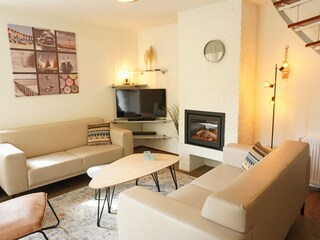 Wohnzimmer mit elektrike Kamin