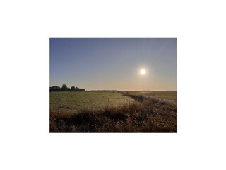 Sonnenuntergang in der Krummhörn