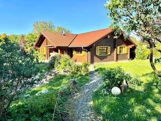 Süd-/Westansicht mit überdachter Terrasse