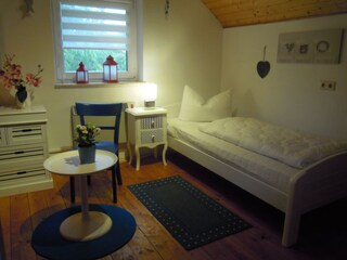 Schlafzimmer mit 2 Einzelbetten im Obergeschoss