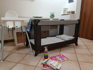 Baby cot and highchair