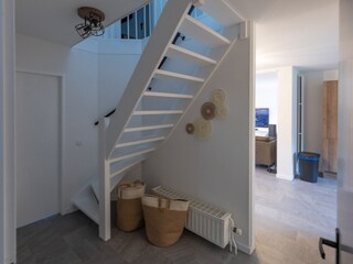 Der Corridor mit Treppe nach oben