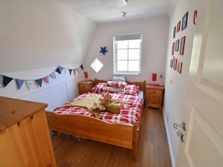 Schlafzimmer 1 (mit Doppelbett)