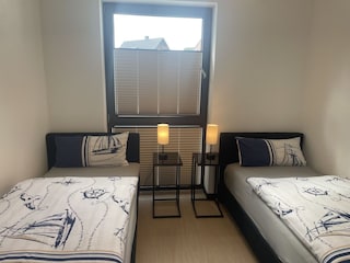 Zweites Schlafzimmer mit 2 Einzelbetten