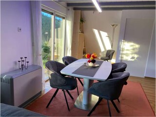 The dining table is extendable and offers enough space for all guests