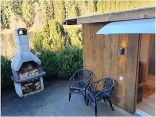 Sie können auch vor der Sauna grillen