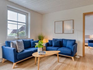 Ferienwohnung Lüttje Ginsterhaus – Käpt´n Pep