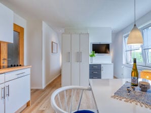 Ferienwohnung Lüttje Ginsterhuus - Inselfeuer