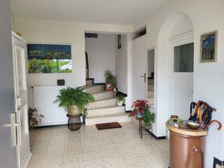 Foyer zum Treppenaufgang in die Ferienwohnung