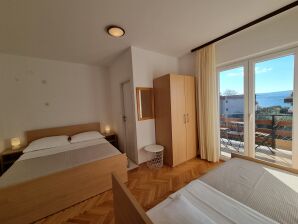 Two bedroom apartment with terrace and sea view Duće, Omiš A-2821-b