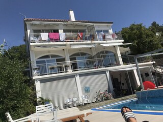 view from the pool towards the house