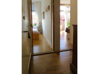 Beachtime, hallway to the bedroom and the living room.