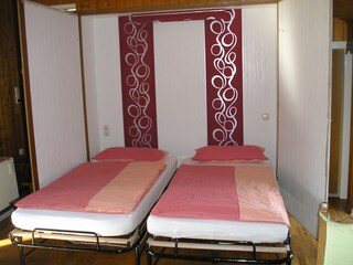 Double wardrobe bed in combi-room