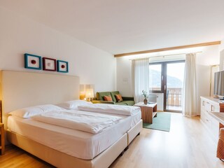 Appartamento per vacanze Schenna Camera da letto 8