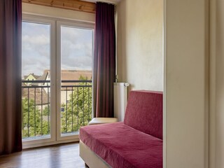 Kinderschlafzimmer mit Stockbett und Schlafcouch