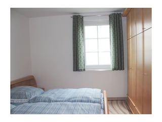 Schlafzimmer mit Doppelbett