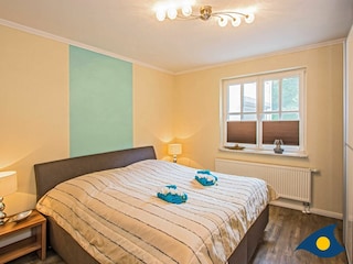 Schlafzimmer mit Doppelbett