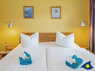 Schlafzimmer mit Doppelbett