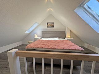 Schlafzimmer3 mit einem Boxspringbett + Einzelbett