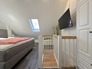 Schlafzimmer3 mit einem Boxspringbett + Einzelbett