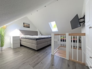 Schlafzimmer 3 im Haus 30 A mit TV