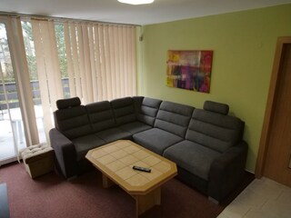 one of both identical living rooms - sofa