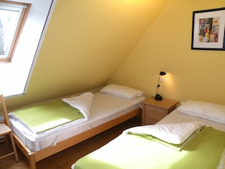 Schlafzimmer mit Einzelbetten