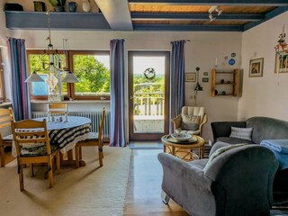 The dining area and access to the balcony