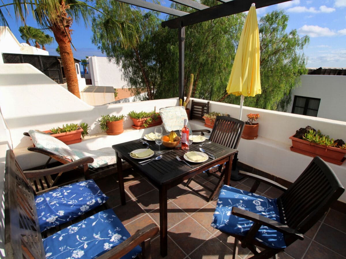 Balcony with lounger for sunbathing