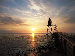 Sonnenuntergang beim Leuchtturm Eversand